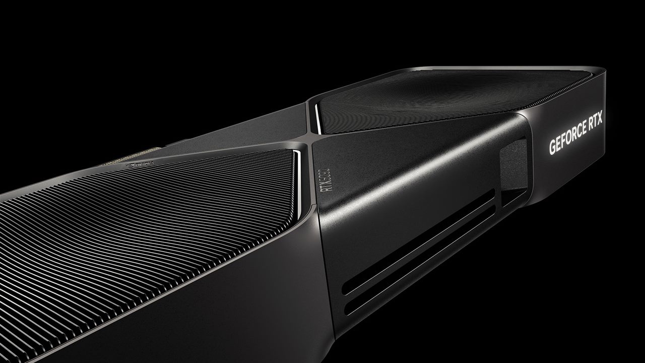 A low-angle shot along the length of an RTX 5090 Founders Edition, its fins catching the light.